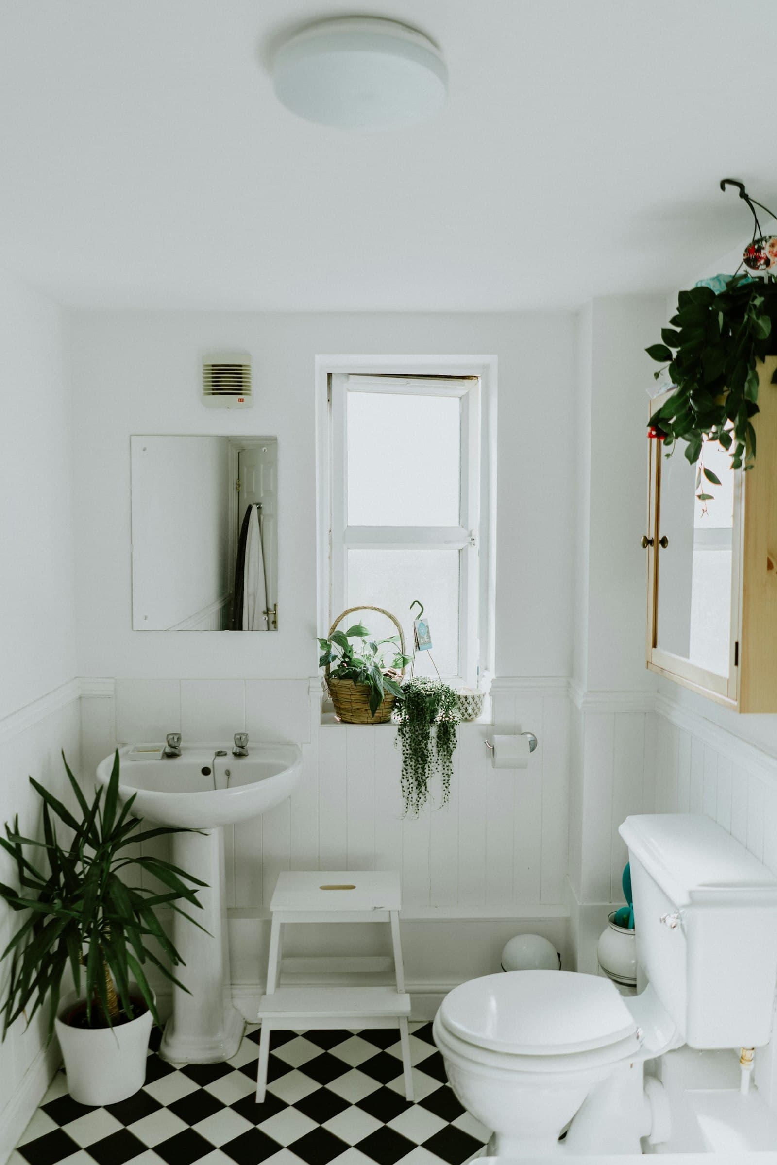 A finished modern bathroom with a walk-in shower and tiled walls (illustrative)
